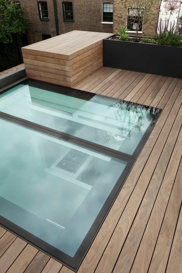 Luxury flat roof terrace conversion in SW10 London, creating the perfect setting for elegant outdoor entertaining.