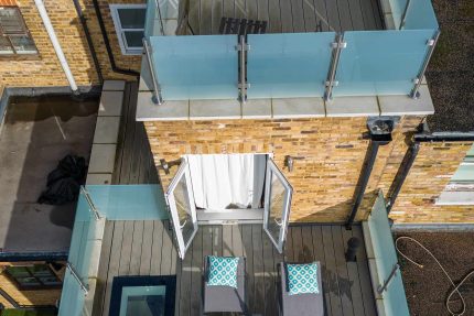 Outdated flat roof completely transformed into a modern, stylish rooftop terrace in Chelsea.