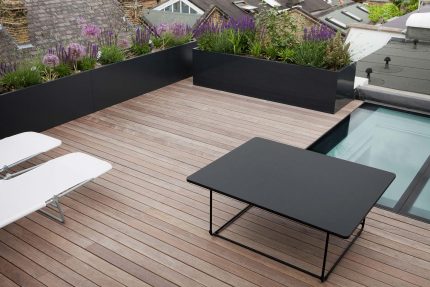 Opulent rooftop retreat offering a tranquil outdoor living experience in the heart of Chelsea.