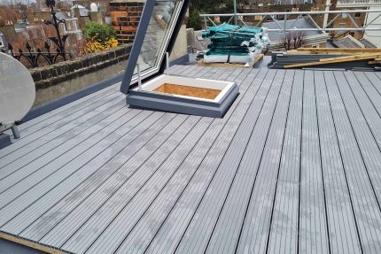 Inviting Hampstead roof terrace designed by a professional flat roofer to provide an enjoyable space for social gatherings.