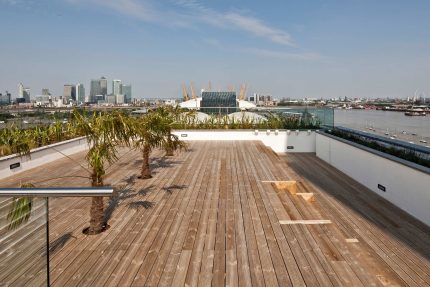 Beautifully designed outdoor restaurant terrace on a converted commercial roof, providing a memorable experience for guests.