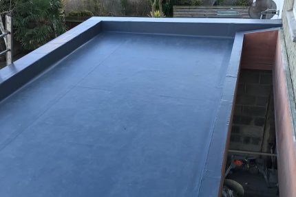 Transformation of a deteriorated felt roof into a stunning rooftop oasis and functional outdoor living space.