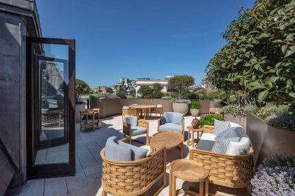 Expertly designed layout of a restaurant rooftop showcasing high-quality finishes and materials for a memorable dining experience.