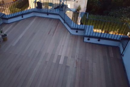 Custom fabricated railings enclosing a beautiful outdoor entertaining area on a newly converted Mayfair roof terrace.