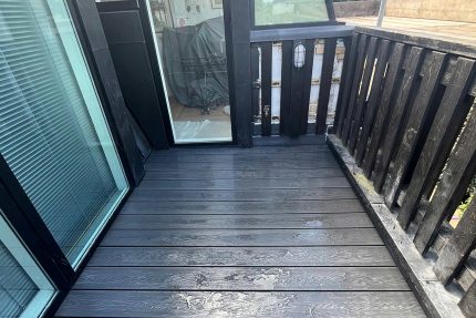 Seamless and visually appealing roof terrace combining modern composite decking with durable flat roof waterproofing.