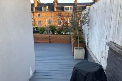 A beautifully designed flat roof conversion in North London creating a vibrant outdoor entertainment area.