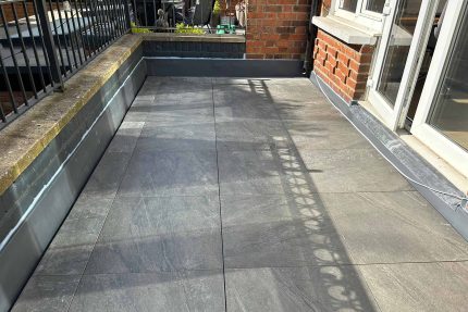 Expertly designed Knightsbridge flat roof conversion featuring a peaceful garden retreat and space for social gatherings.