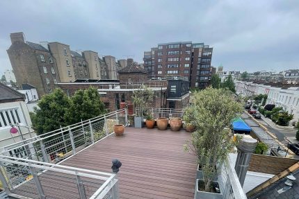 Skilfully installed composite decking on a London roof terrace, designed for durability and contemporary aesthetic appeal.