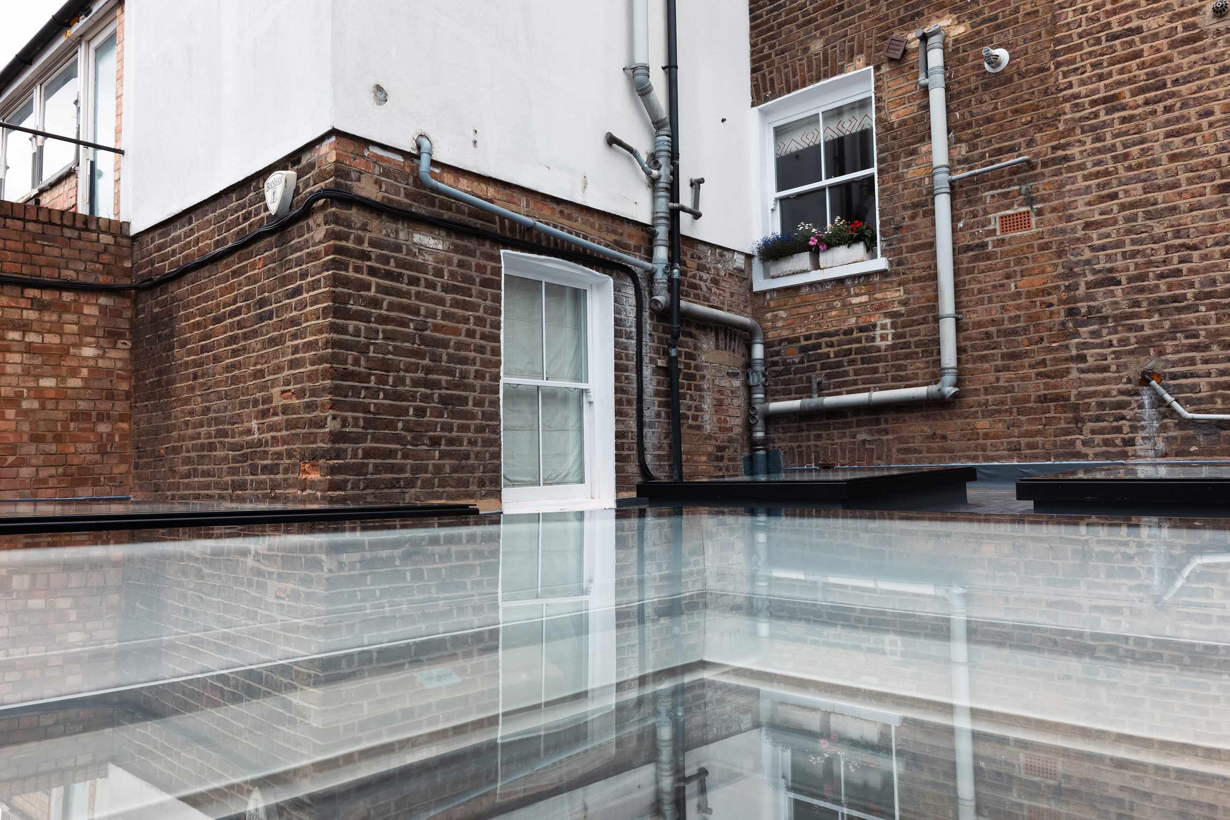 Roofer Notting Hill Electric Velux Skylights Polycarbonate Terrace Builder Designer Contractor Planning Permission Building Regulations