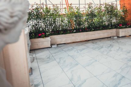 Carefully selected low maintenance urban plants and raised planters enriching this Mayfair roof garden project.