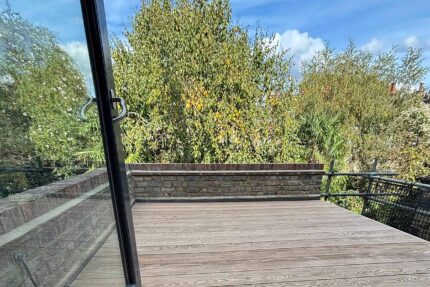 Robust and visually appealing pitched roof seamlessly integrating into the classic architectural landscape of North London.