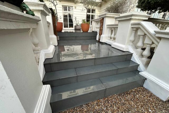 Bespoke roof garden conversion in the heart of Belgravia, London, featuring contemporary tiles and lush greenery.