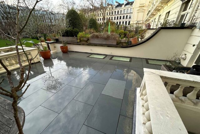 Stunning view from a completed roof garden conversion inviting residents to relax in the London skyline.