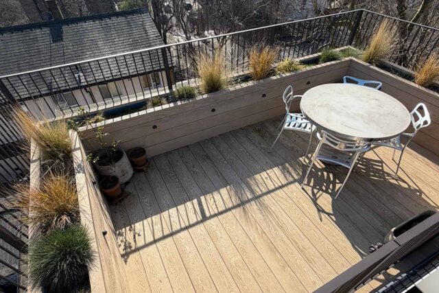 Expansive outdoor dining area built to commercial seating capacity standards by our highly accredited London roofing operatives.