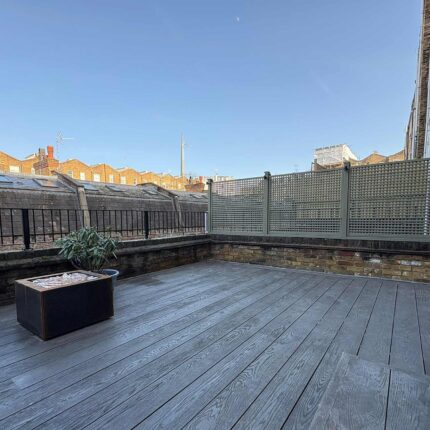 Bespoke timber trellis and weather-resistant composite decking transforming a residential flat roof in Maida Vale, London into a premium outdoor sanctuary.