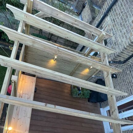Premium floating Millboard decking installed over a highly durable three-layer felt waterproofing system.