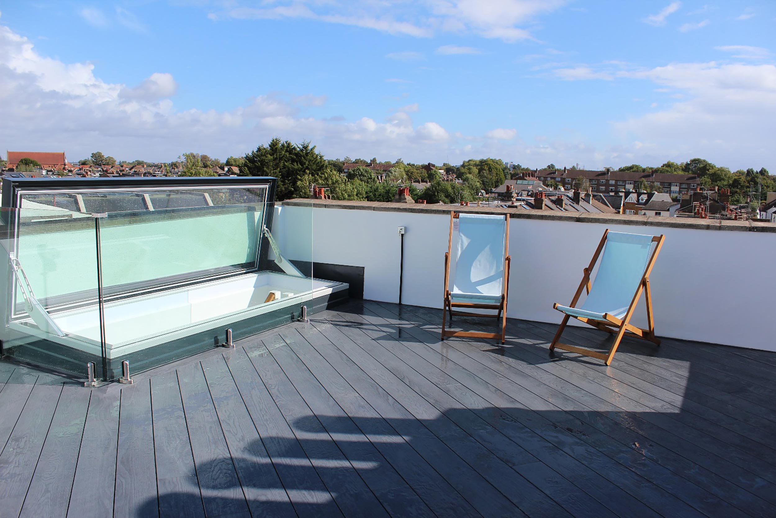 Flat roofer roof garden builders little Venice Maida Vale London we converted an underutilized butterfly roof into a functional terrace.