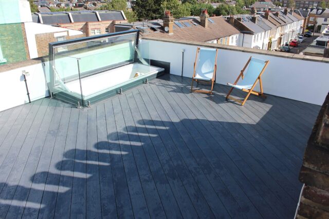 Completed flat roof terrace conversion featuring Ebony Grey Millboard decking in Barnes, London.
