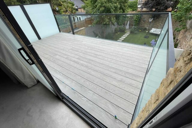 Master bedroom view leading out to a newly constructed flat roof garden terrace.