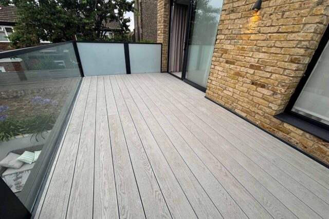 Completed flat roof conversion and modern terrace outdoor space in Queen's Park, London.