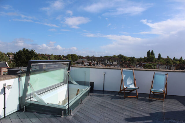 Fully permitted luxury roof garden conversion showcasing seamless indoor-outdoor living.