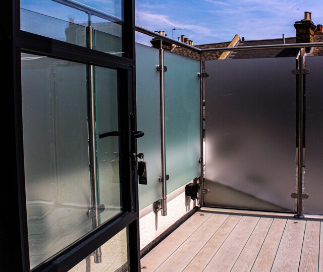 Eco-friendly composite decking laid over a weather-proofed warm roof system by our specialist flat roofer team in Vauxhall, London.